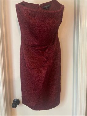 Carmen Marc Valvo strapless beaded burgundy cocktail dress.